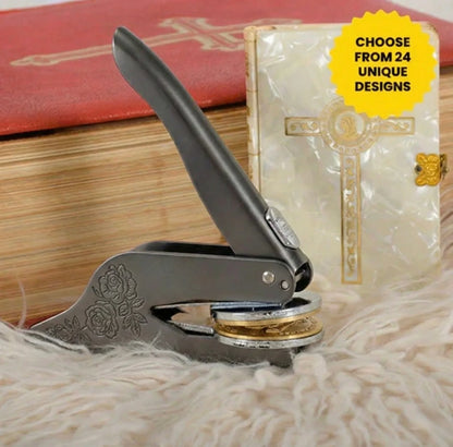 Faith and religious themed custom book embosser displayed next to vintage books.