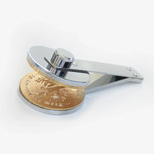 Standard silver interchangeable clip plate for custom library book embossers.