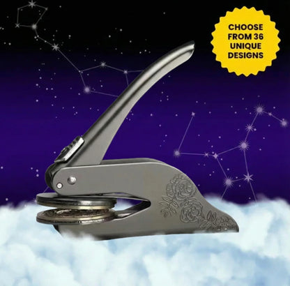 Zodiac and astrology themed custom library embosser against a starry night background.